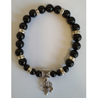 {
  "name": "Black Tourmaline and Four-Leaf Clover Bracelet"
}