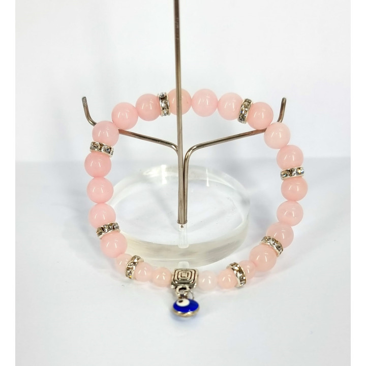 {
  "name": "Rose Quartz Bracelet with Turquoise Eye - Against Jealousy in Love"
}